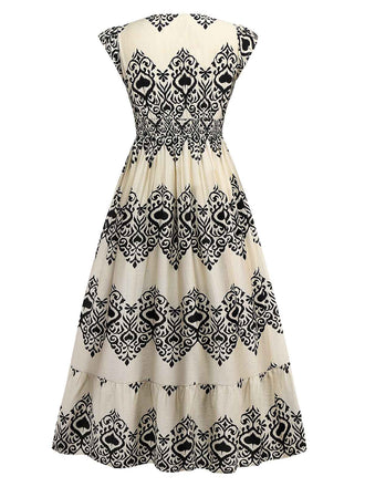 Robe abricot manches mancheron col V imprimé piques années 1970