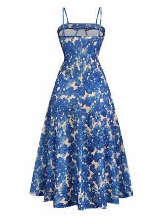 Robe bleue à bretelles motif floral des années 1940