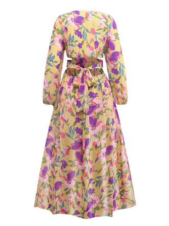 Robe jaune fleur à volants et col en V profond années 1930