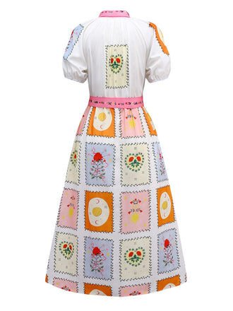 Robe ceinturée multicolore fleurs motif soleil et lune des années 1930
