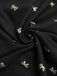 Robe fendue en dentelle noire col en V et nœud en feuille d'or des années 1930