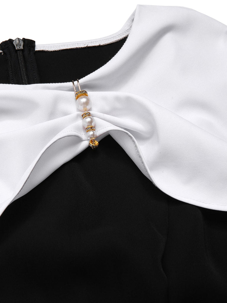 [Prévente] Robe cape froncée noire et blanche avec broche perlée des années 1940