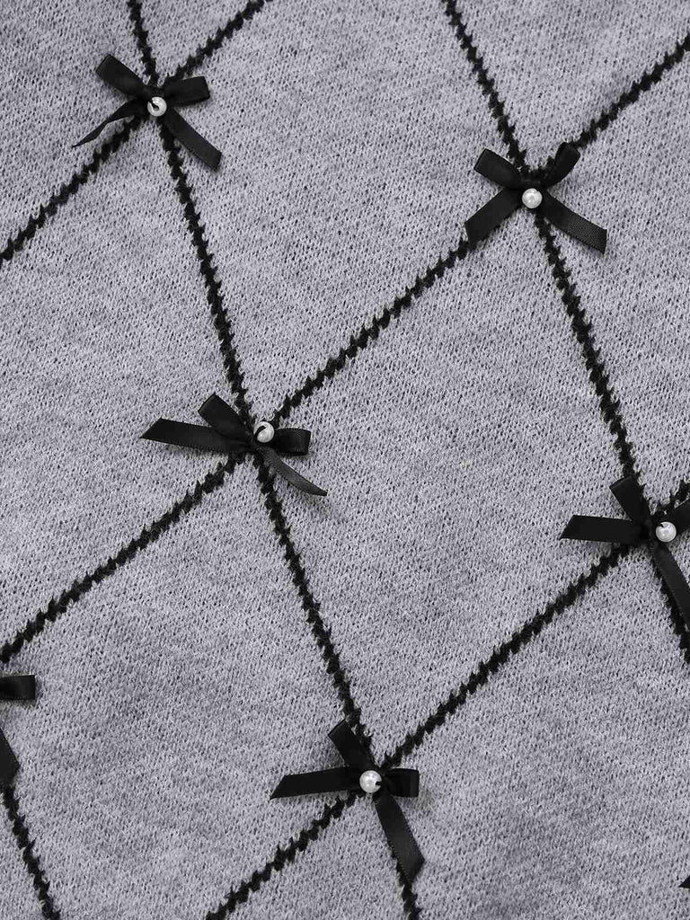 Pull-over gris à col rond et nœud papillon années 1950