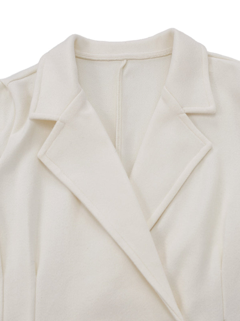 Manteau blanche en fausse laine à boutons nacrés années 1940