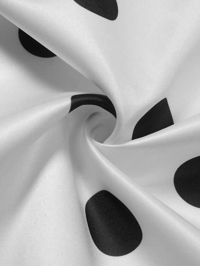 Robe cache-cœur à pois ceinturée et col en V années 1950