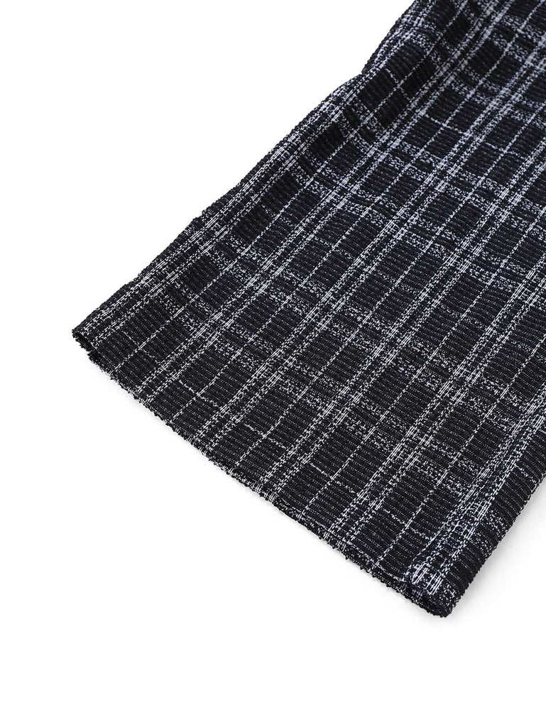 Combinaison salopette noire à carreaux en coton col en V profond des années 1940