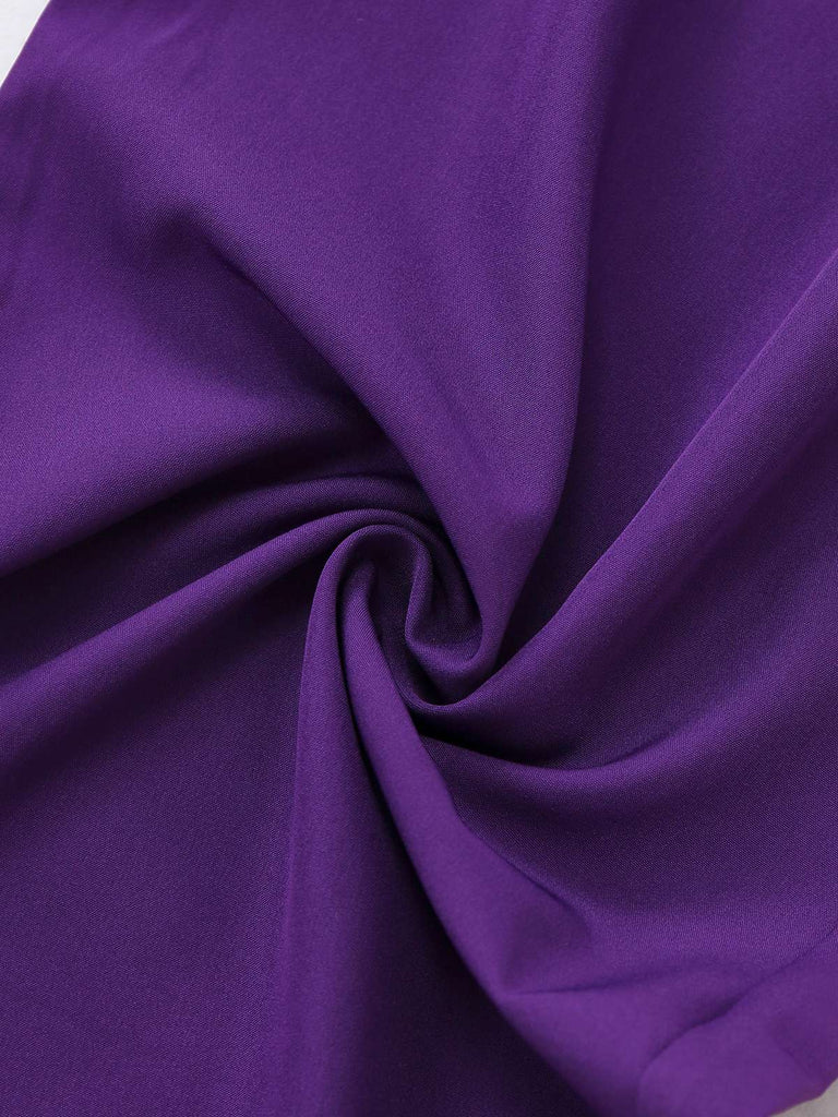 Combinaison violette col montant manches asymétriques des années 80