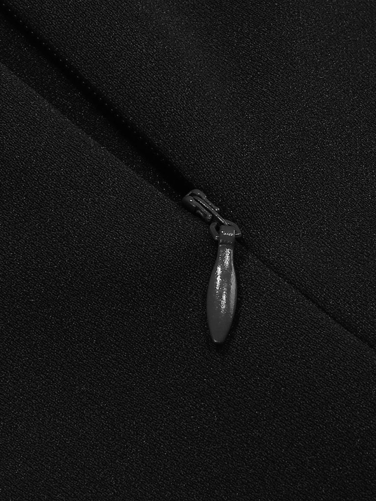 Robe trapèze à pois col nœud manches cape des années 1950