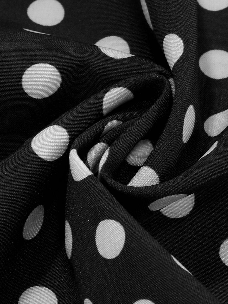 Robe trapèze à pois col nœud manches cape des années 1950