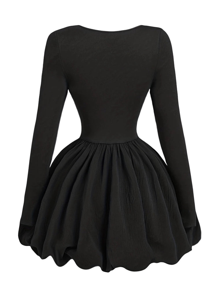 Robe patineuse noire nœuds papillon manches fines années 70