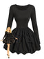 Robe patineuse noire nœuds papillon manches fines années 70