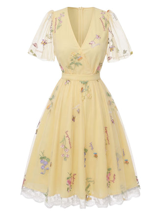 [Prévente] Robe jaune manches bouffantes et broderies florales en résille années 50