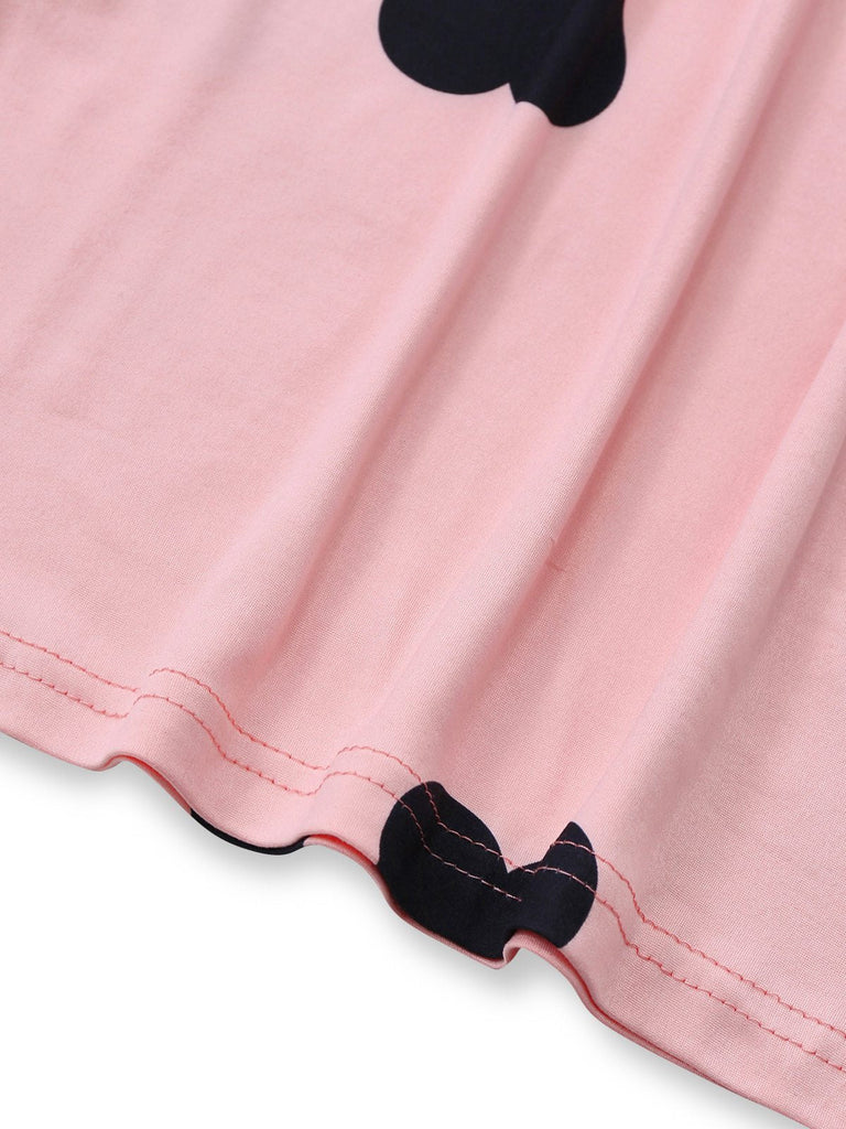 Robe moulante rose à col rond et motif cœur années 60