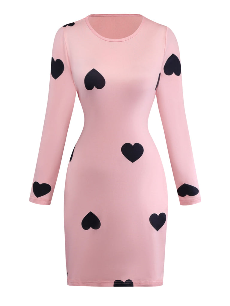 Robe moulante rose à col rond et motif cœur années 60