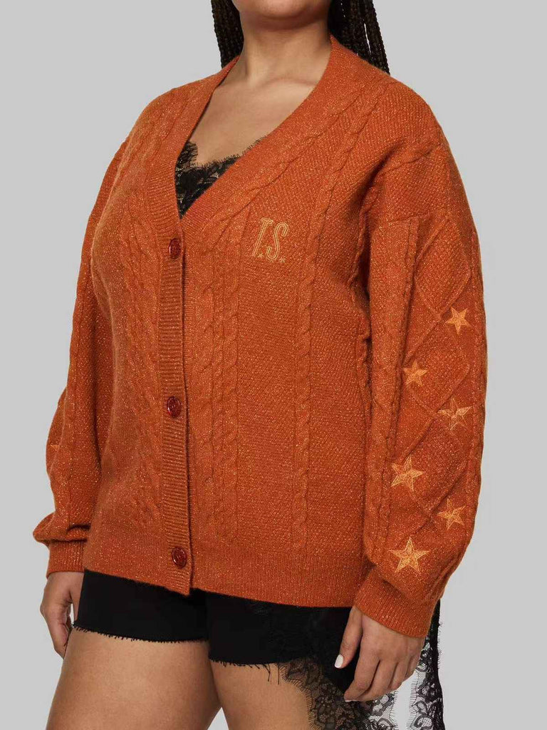 Gilet orange à col en V et broderie d'étoiles années 1940