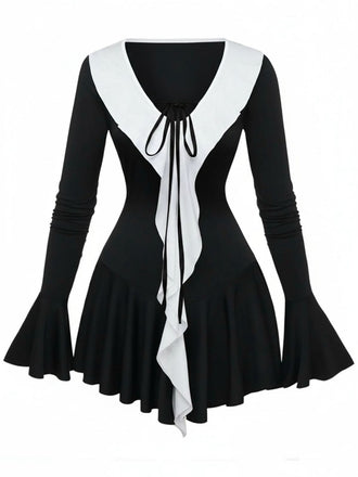 Robe péplum à volants noire et blanche années 1960
