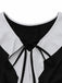 Robe péplum à volants noire et blanche années 1960