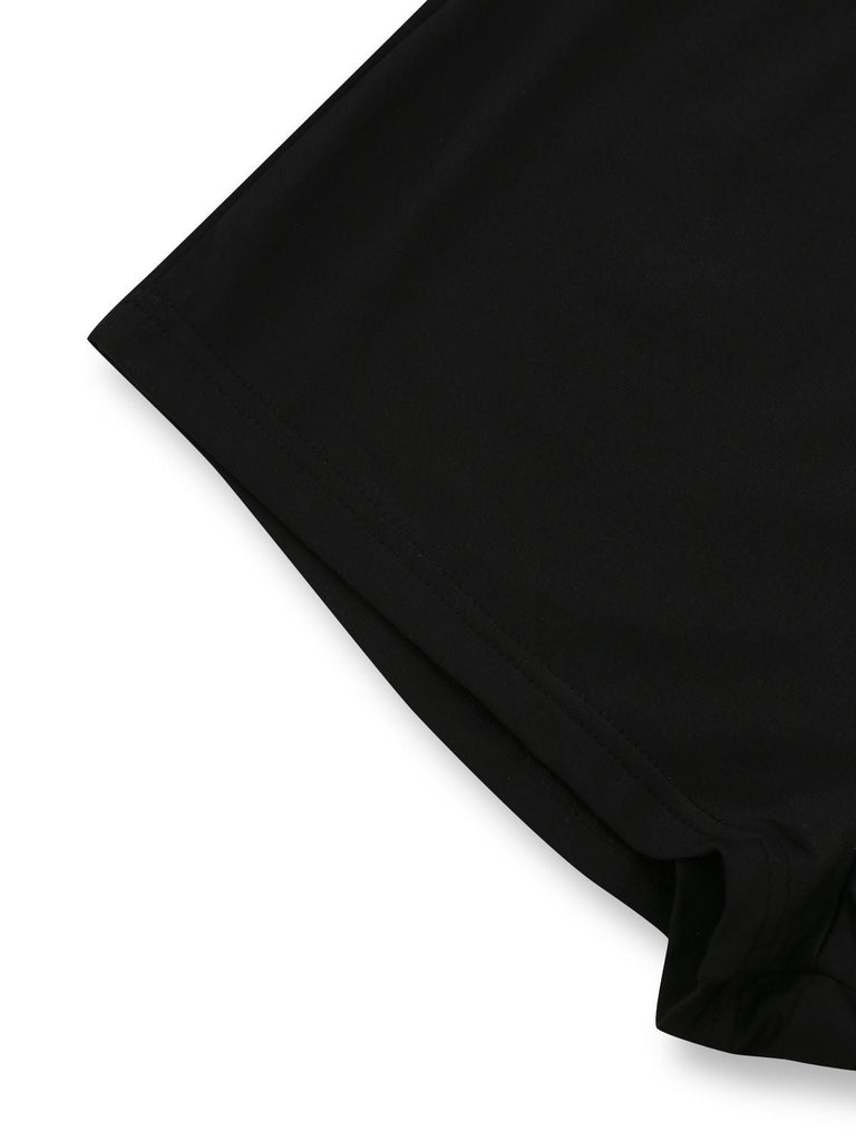 Combinaison body noire à manches longues et découpes en dentelle années 1950