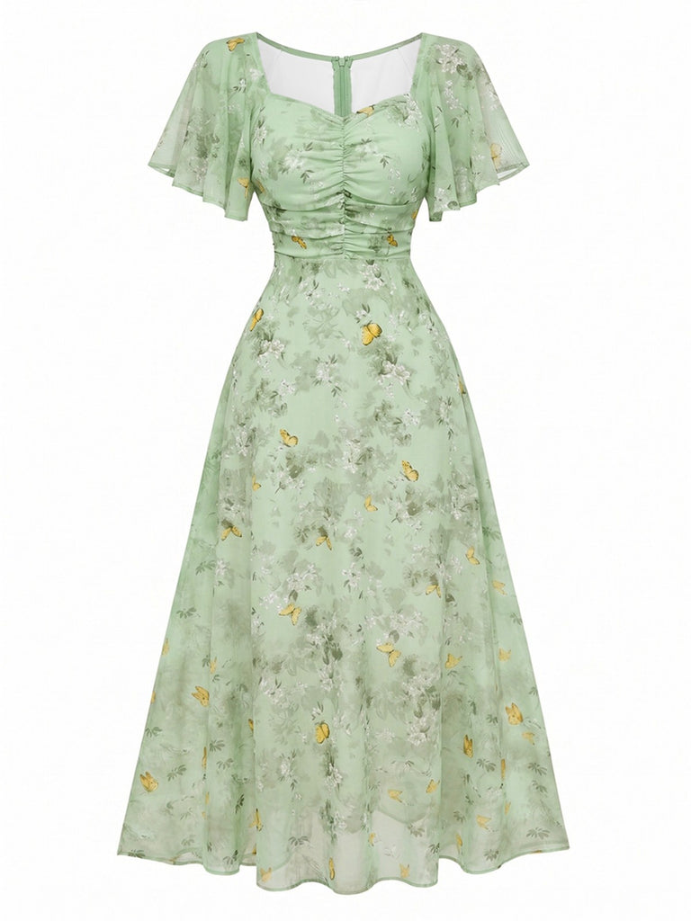 Robe bleu mousseline à manches papillon années 1930