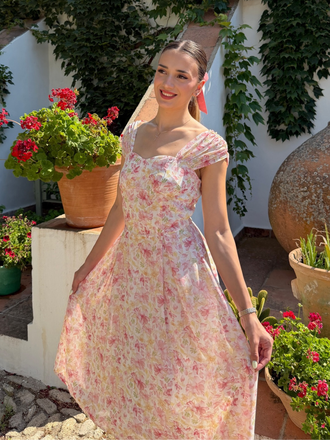 Robe rose floral décolleté cœur avec nœud années 50