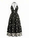 Maxi-robe bohème noire dos nu et col halter années 70
