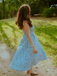 Robe midi bleu fines bretelles floral années 1950