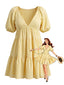 Robe babydoll jaune col V et manches bouffantes années 1950