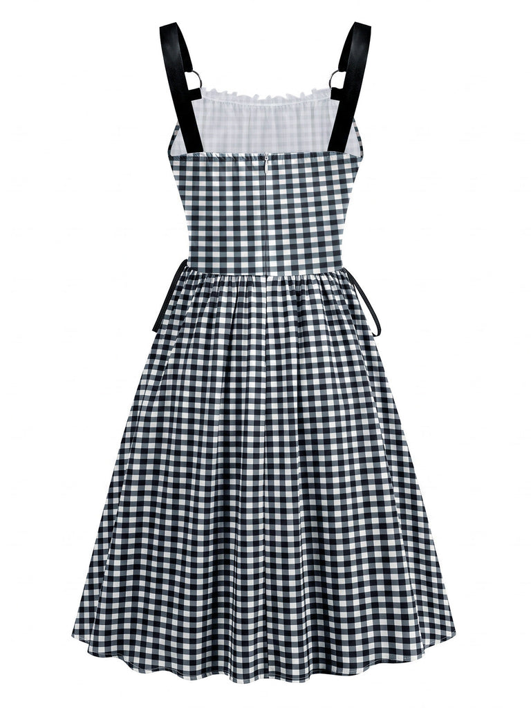 Robe taille haute à larges bretelles, laçage et anneau métallique Années 1950