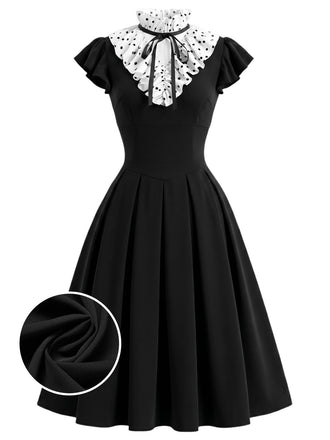 [Prévente] Robe noire à pois, col volanté et coupe en A Années 1950