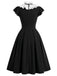 [Prévente] Robe noire à pois, col volanté et coupe en A Années 1950
