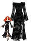 Robe noire en tulle motif floral gothique épaules dénudées et fendue années 30