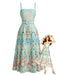 Robe smockée et ceinturée vert givré motif plantes tropicales années 70