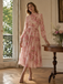Robe longue rose  mousseline motifs floraux manches longues et ceinture années 1940