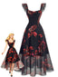 Robe noire tulle motif lys rouges et manches volants années 40