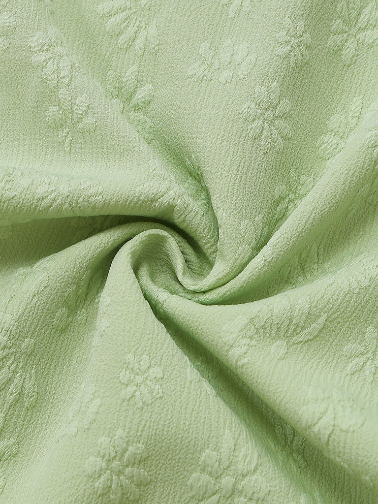 Combinaison vert à bretelles fines, nœud, jacquard et jambes larges Années 1950