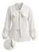 [Prévente] Blouse blanche en dentelle à col lavallière et manches lanternes Années 1970