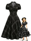 [Prévente] Robe noire à carreaux col à revers manches bouffantes et ceinture Années 1950