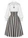[Prévente] Robe d’Halloween noire et blanche à toile d’araignée et rayures verticales années 1930