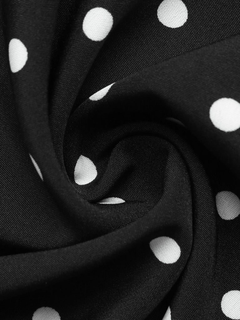 Robe noire à pois, col Chelsea et manches longues années 1950