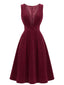 Robe tablier plissée velours côtelé col V profond années 1950