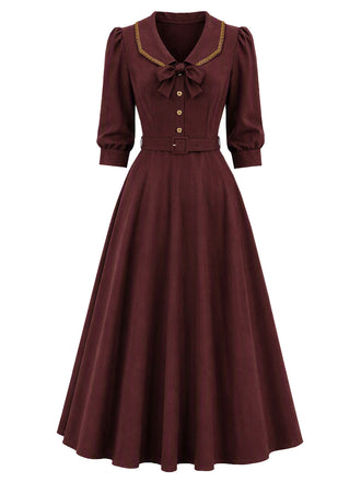 [Prévente] Robe lie-de-vin à nœud, revers et manches au coude années 1950