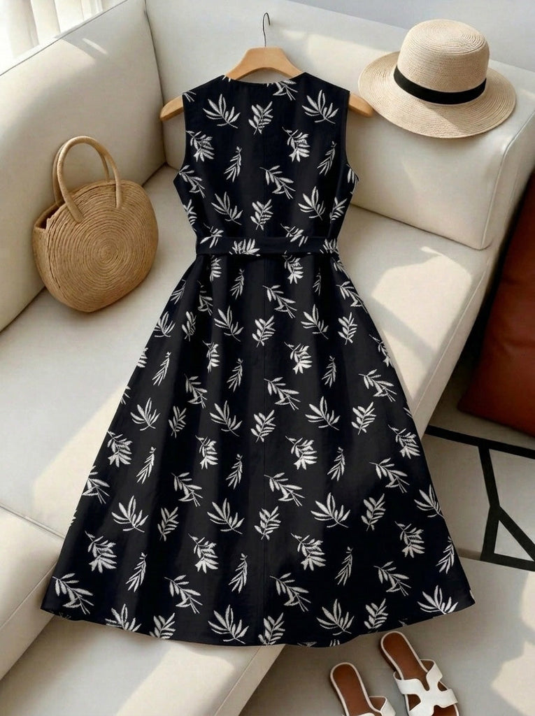 Robe ceinturée à col rond et motif de feuilles botaniques années 1950