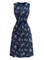 Robe encolure ronde motif feuillage botanique et ceinture années 50