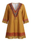 Robe bohème marron col V et franges pompons années 70