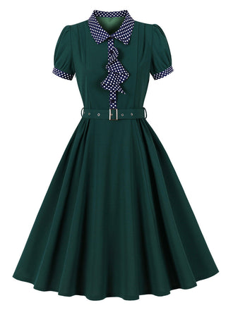 Robe évasée verte à pois, col, manches bouffantes et ceinture années 1950 - 1