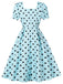 Robe évasée bleue à pois, col carré et manches bouffantes années 1950