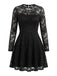 Robe courte noire en dentelle fleurie, empiècement transparent et manches longues années 1960 - 1