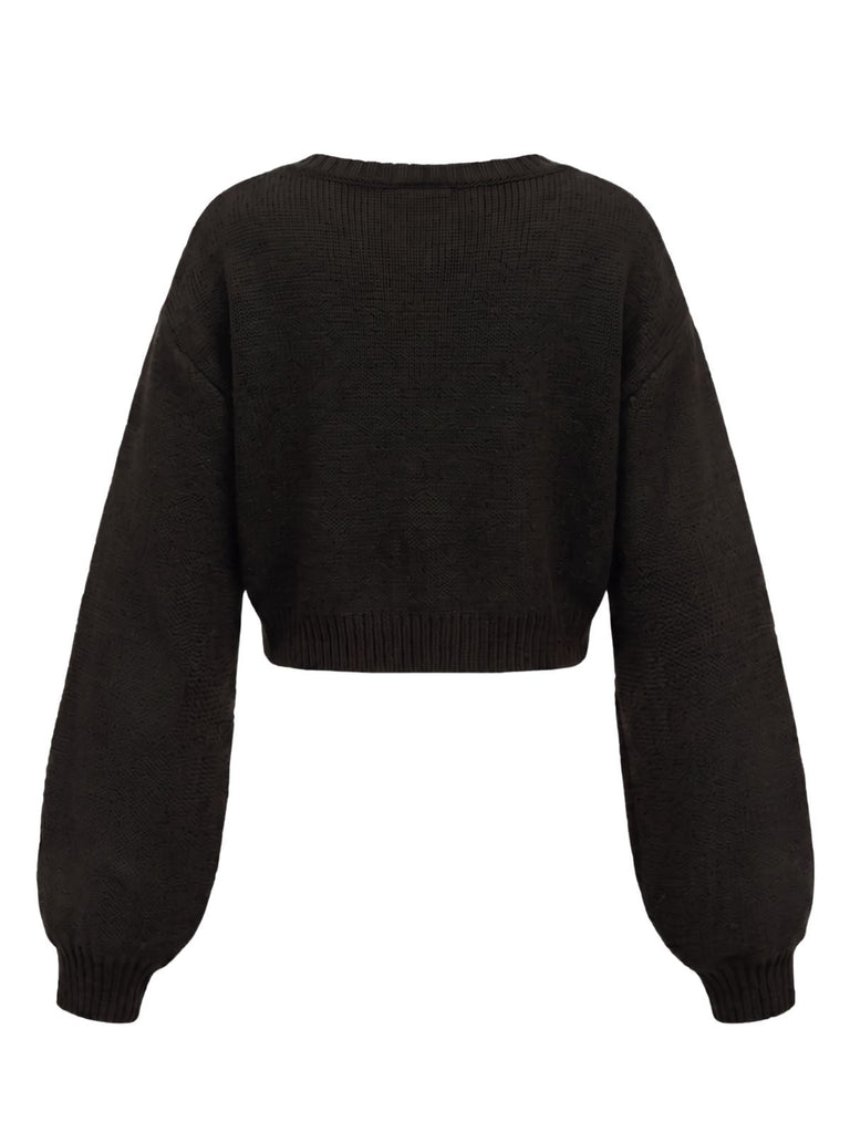 Cardigan court en maille brodée soleil et étoiles années 1960