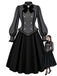 [Prévente] Robe noire à fines rayures, col montant et manches évêque années 1950