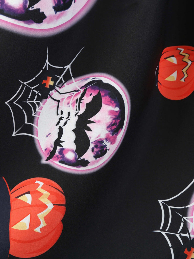 Robe noire d’Halloween à col pétale et manches longues années 1950